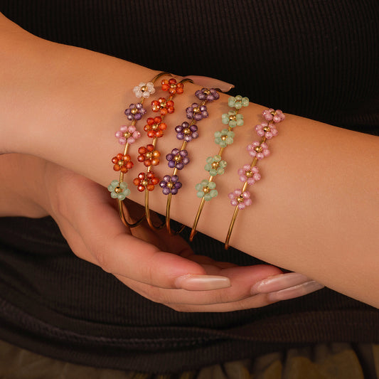 Bracciale a fiore minimalista elegante in acciaio al titanio e zircone con finitura placcata da donna