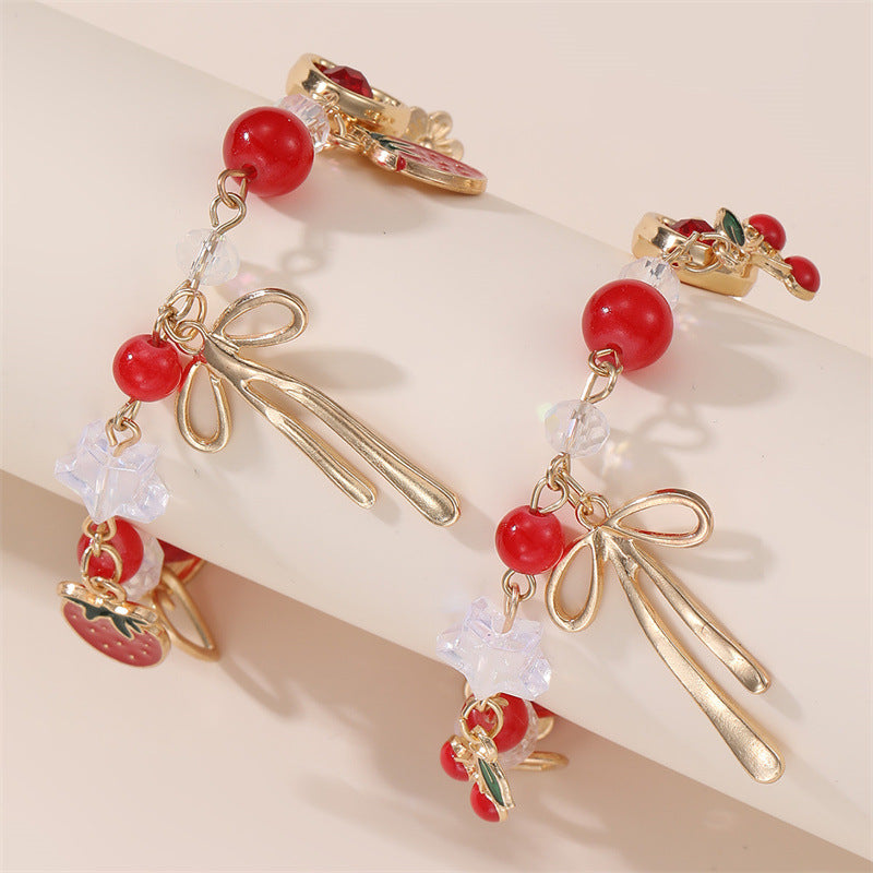 Pulsera con dije de lazo de corazón de cereza dulce para niñas, hecha de resina con detalles artesanales