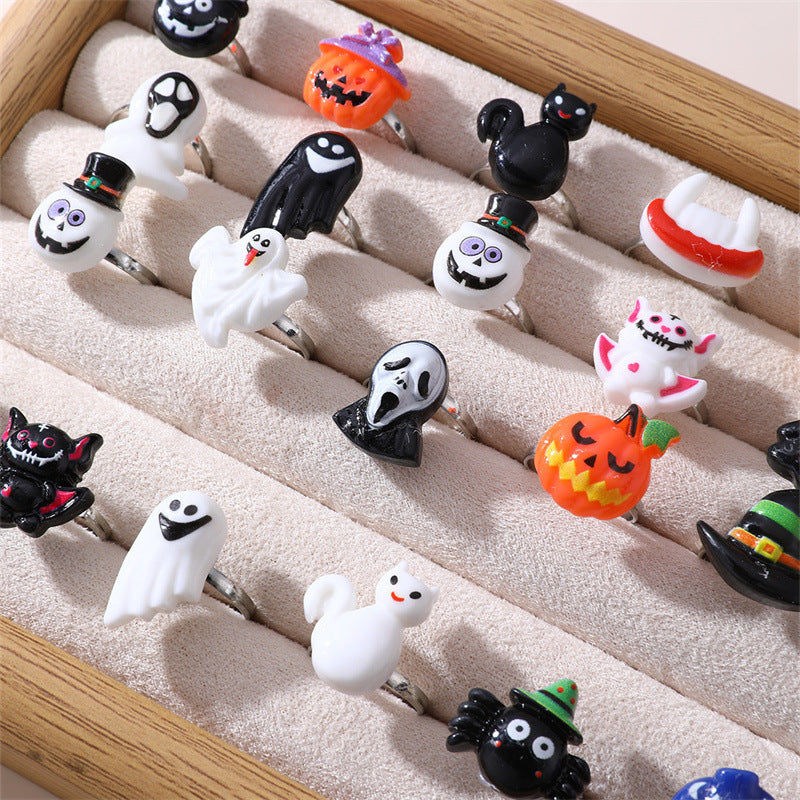 Juego de anillos infantiles con temática de Halloween, con diseños de calabaza, calavera y fantasma, anillos de plástico de resina para niñas de 6 a 10 años