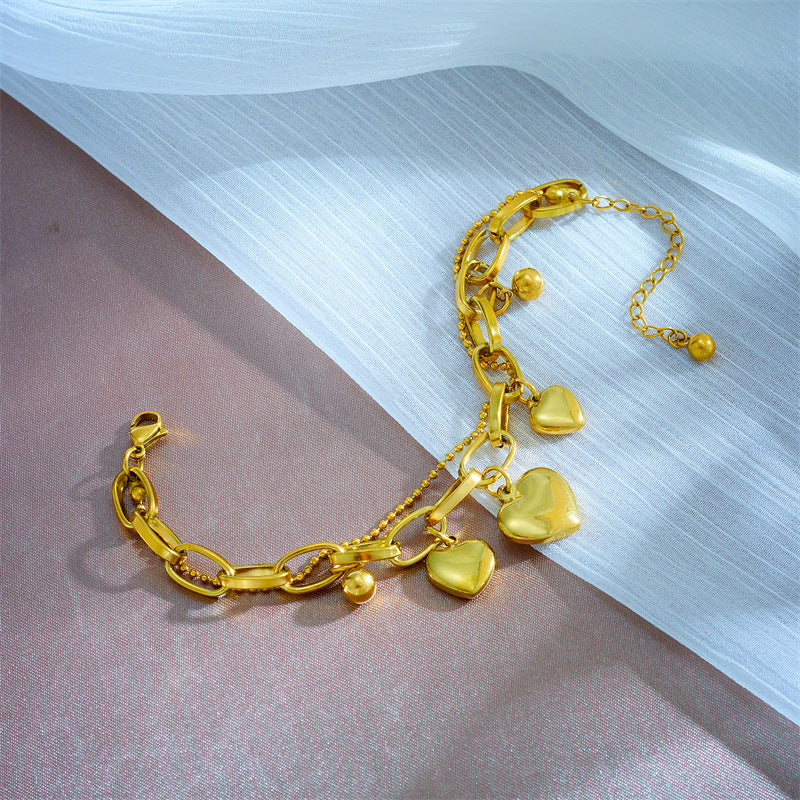 Bracciale vintage a cuore placcato in acciaio al titanio con design a catena multistrato da donna