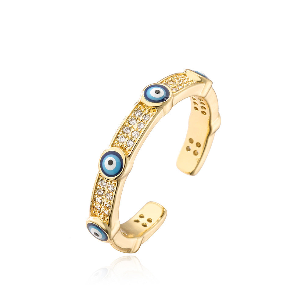 Anello Minimalista Geometrico Occhio di Allah da Donna in Rame Placcato Oro con Intarsio di Zirconi