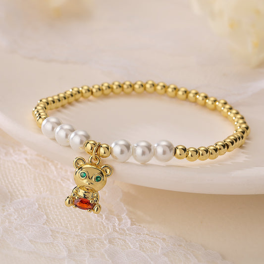 Cadena de mano con diseño de oso lindo para mujer con base de cobre bañada en oro real y circonita micropavé