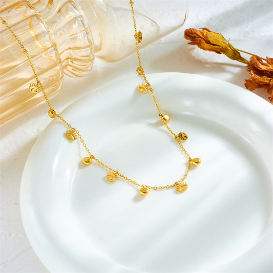 Collana Minimalista con Ciondolo Occhio Vuoto Piccolo in Acciaio al Titanio con Intarsio di Strass e Finitura Placcata