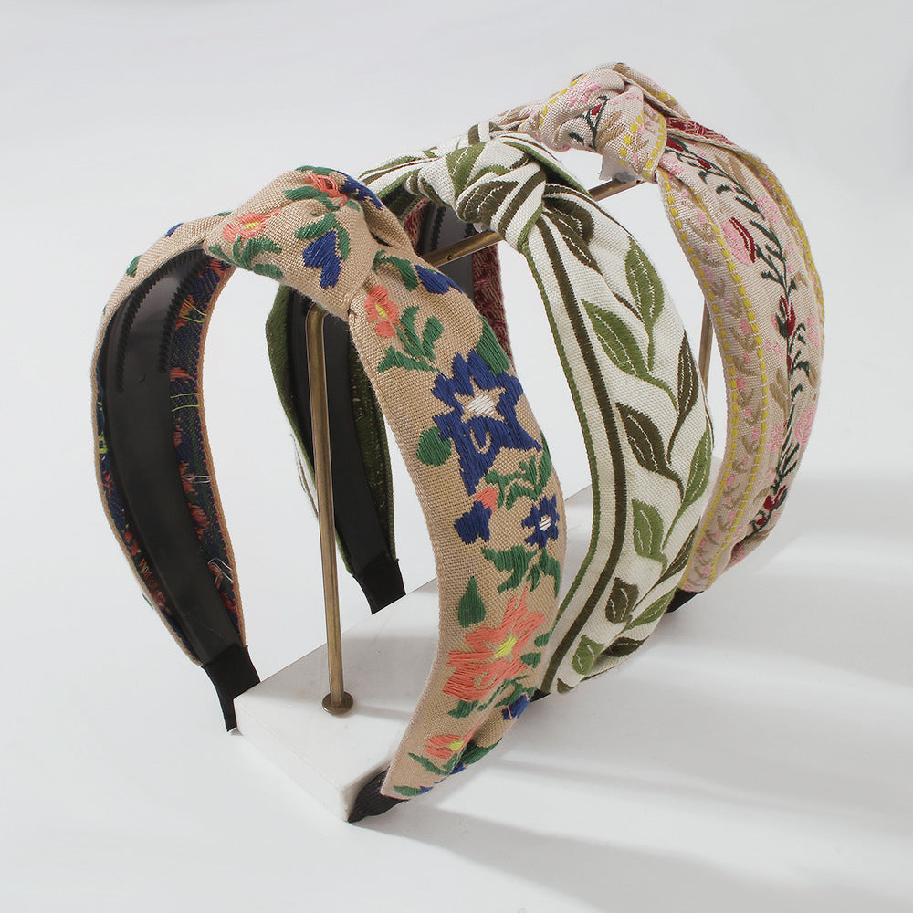 Diadema minimalista de tela para mujer con motivo floral y de hojas bordado