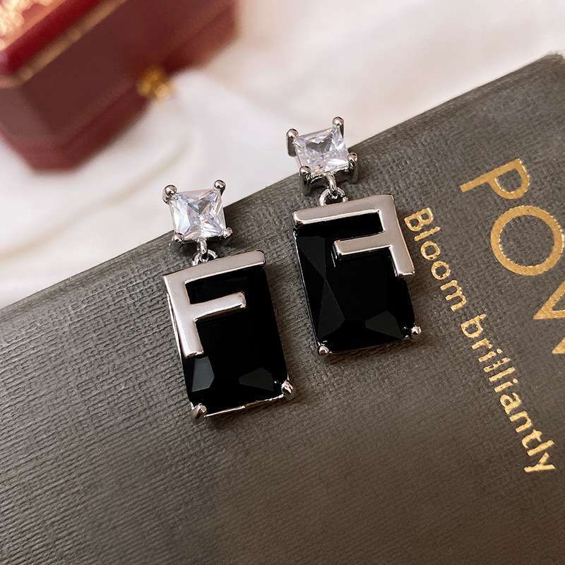 Luxury Style Heart-Shaped Enamel Gold-Plated Silver Needle Earrings for Women with Minimalist Black Accent