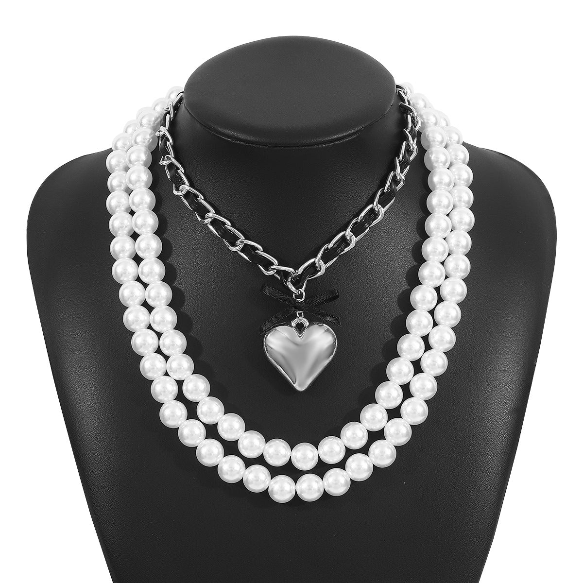 Collana con pendente a cuore e fiocco d'ispirazione vintage con perle finte in lega placcata su pelle PU e nastro per donna