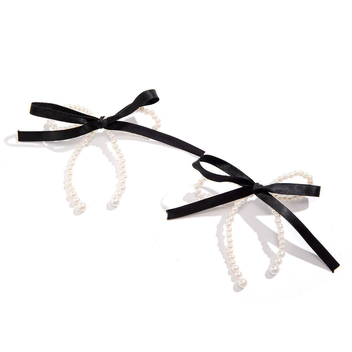 Pendientes de tuerca minimalistas en forma de lazo con perlas de imitación y postes de acero inoxidable