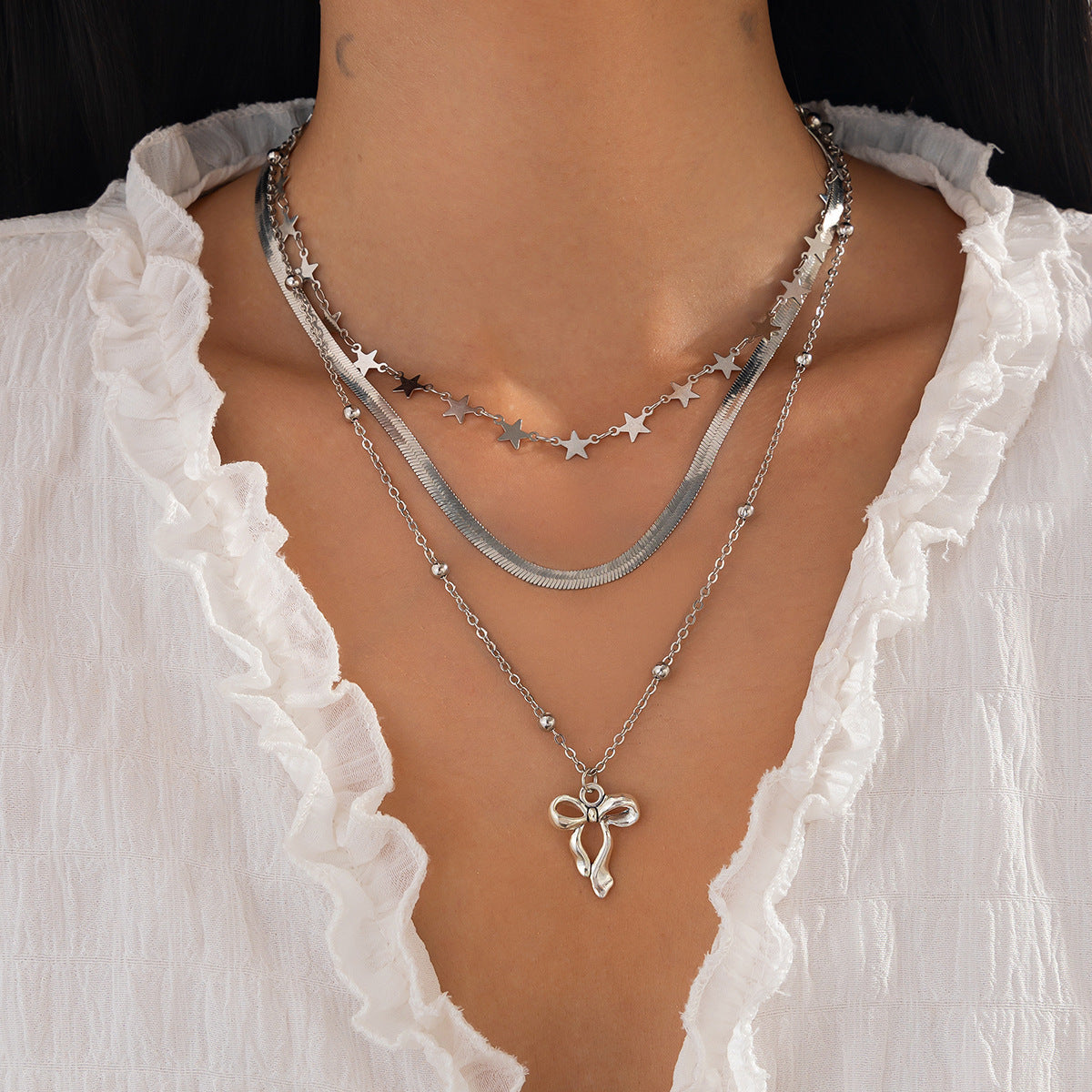 Set di collana con ciondolo a stella geometrico dolce e audace per donne con catena in rame e ciondolo in lega