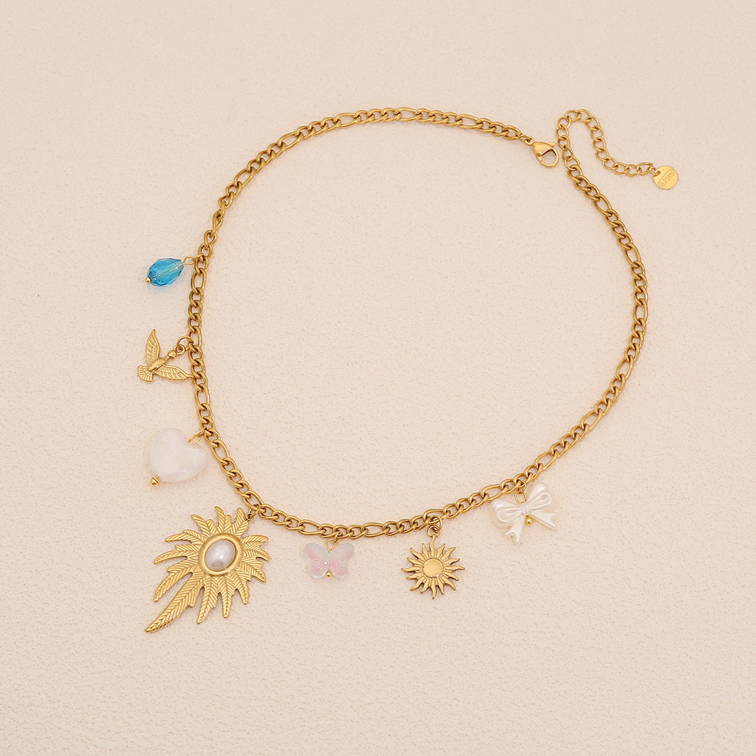 Collana in acciaio inossidabile placcato a forma di foglia, stile OL alla moda, con ciondolo a forma di girasole e perla, per donna