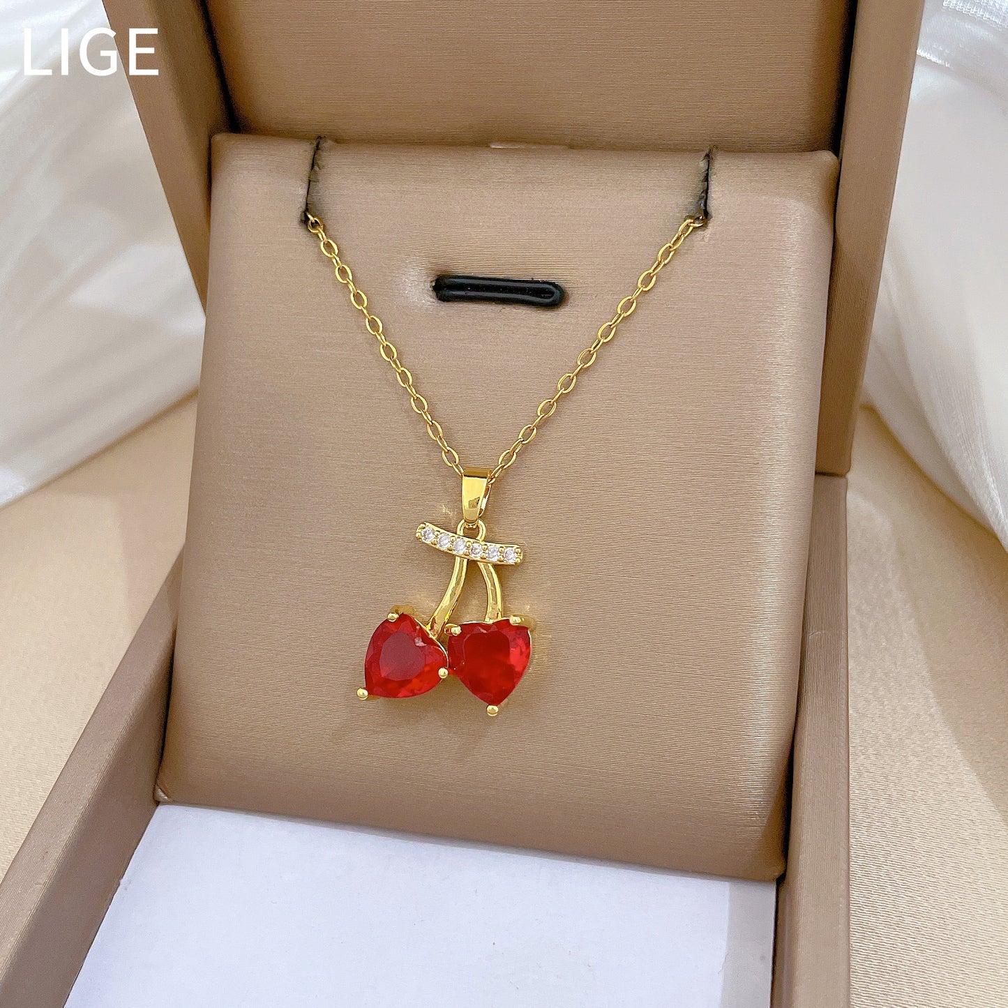 Collar de acero inoxidable con forma de cereza de dibujos animados con incrustaciones de diamantes de imitación para mujeres y hombres, delicada cadena de clavícula