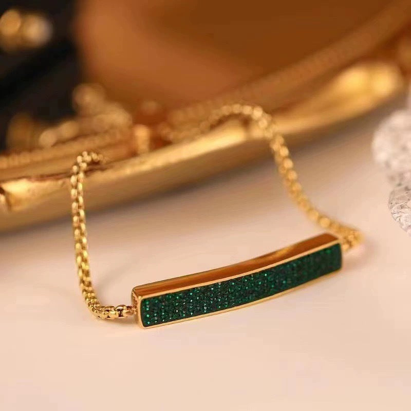 Bracciale da donna in acciaio al titanio con catena a tirante, design geometrico minimalista e finitura placcata, lusso elegante