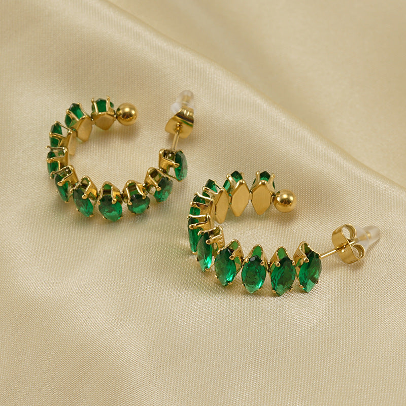 Orecchini a perno da donna alla moda geometrici in acciaio al titanio placcato oro 18K con zirconi