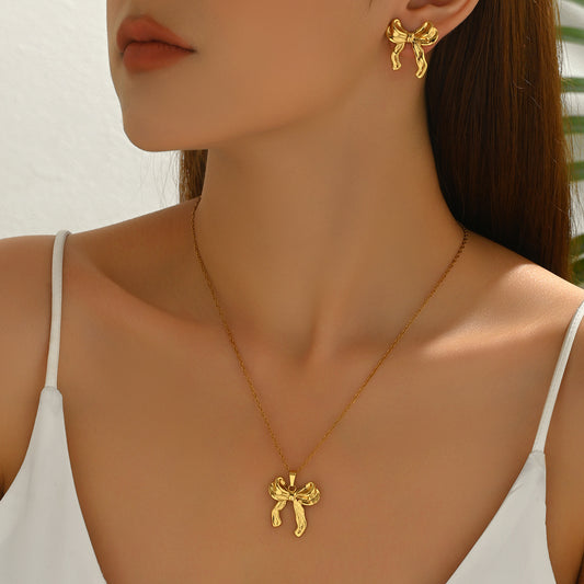 Fashion-Ready Geometric Bow Pendant Necklace Set with Matching Earrings in Alloy with Plated Finish