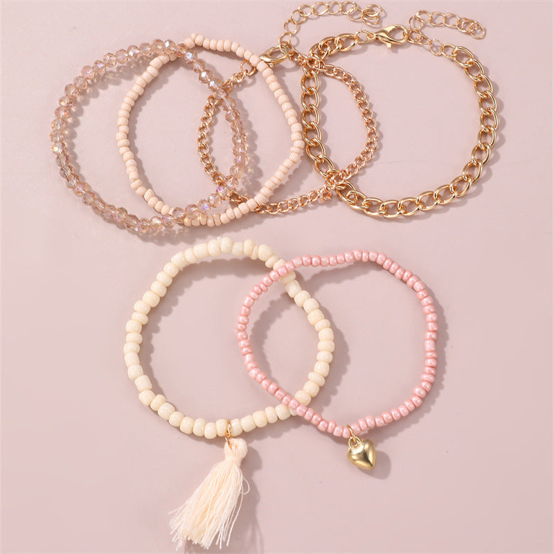 Set di braccialetti minimalisti con perline di vetro a forma di cuore per ragazze, con dettagli in perle e manifattura artigianale