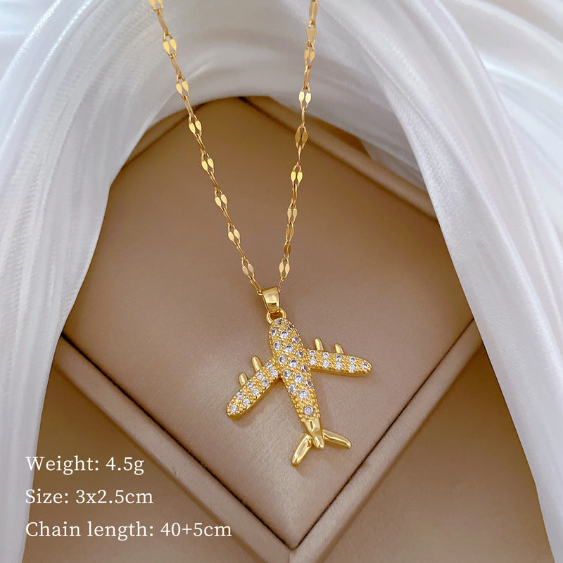 Collar con colgante de avión de combate de lujo con diamantes de imitación para mujer y hombre, cadena de eslabones geométrica de acero de titanio con motivo de luna