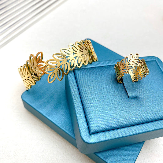 Elegante bracciale da donna a forma di spiga di grano in acciaio al titanio con trama a maglie e motivo irregolare