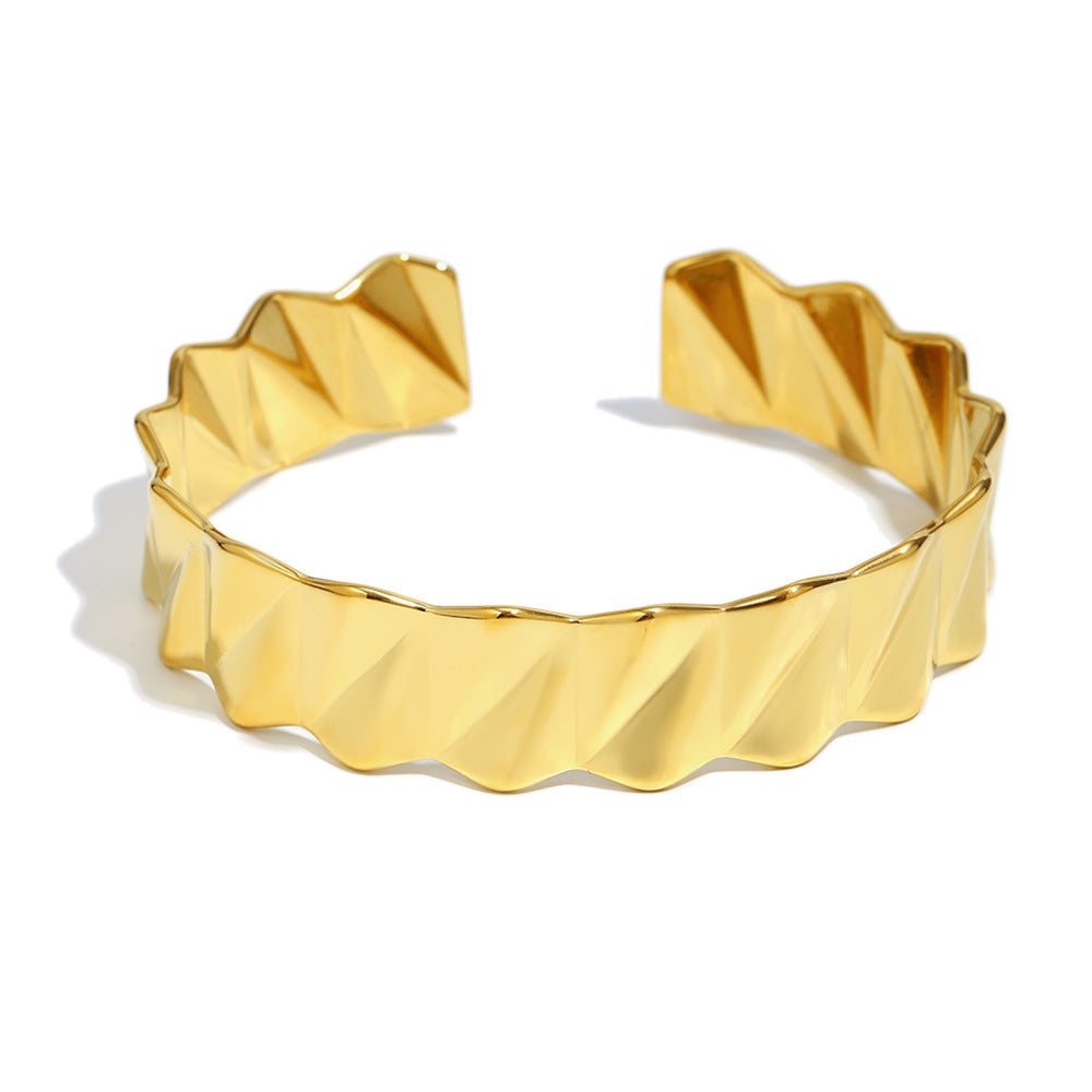 Bracciale da donna rigido in acciaio inossidabile placcato oro 18K con motivo a onda geometrico minimalista alla moda