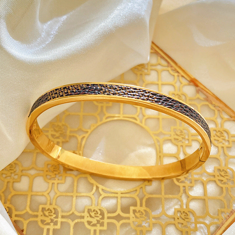 Minimalist Titanium Steel Plated Bracelet with Black Leather Texture