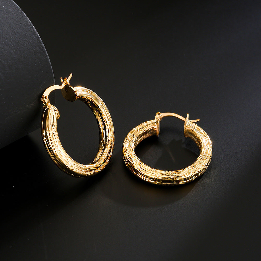 Aretes Redondos Geométricos en Cobre con Baño de Oro de 18K y Incrustación de Zircón para Mujer