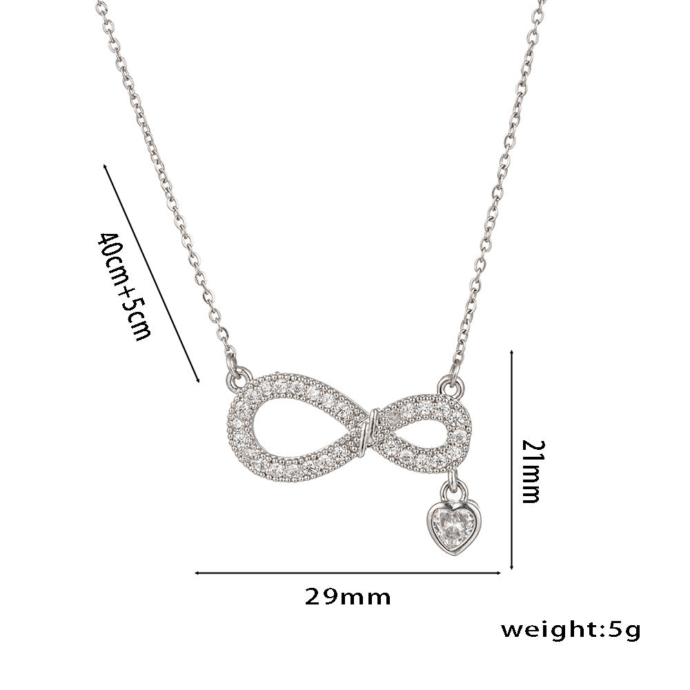 Collar de titanio minimalista con diseño de corazón en forma de ocho, microincrustaciones de circonia y colgante de cristal para mujer