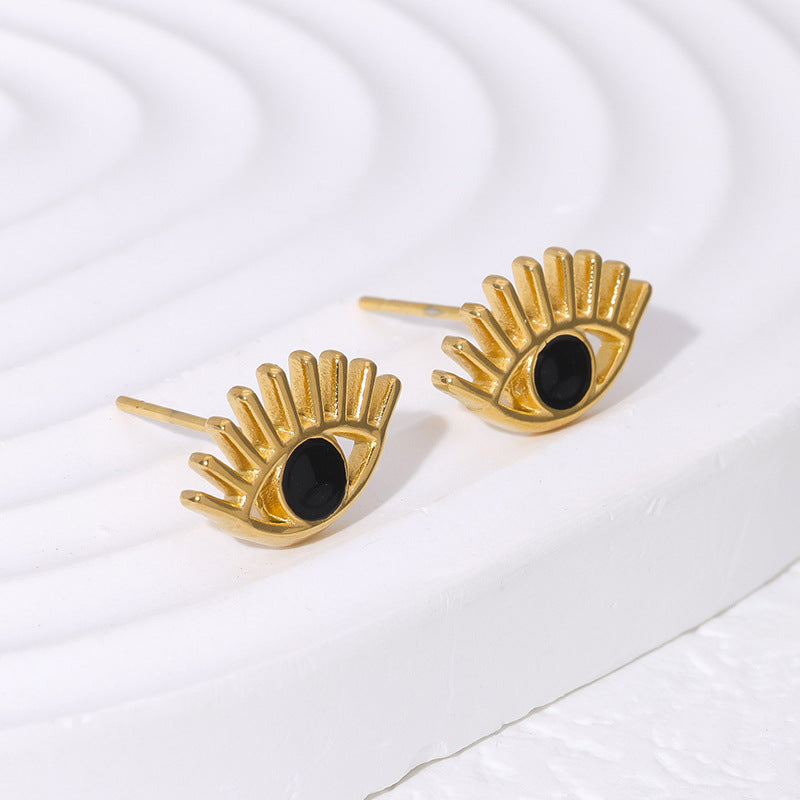 Pendientes de botón con forma de ojo de demonio atrevido de acero de titanio con chapado en oro de 18 quilates para mujer