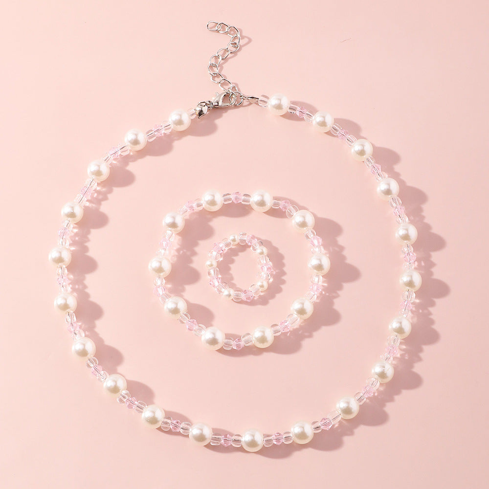 Juego de collar y pulsera de perlas con diseño de dibujos animados para niñas con cuentas de cristal transparente en un dulce y fresco diseño