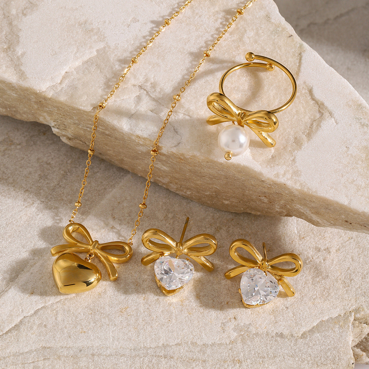 Pendientes de acero inoxidable con nudo de lazo geométrico de moda, chapados en oro de 18 quilates y circonitas