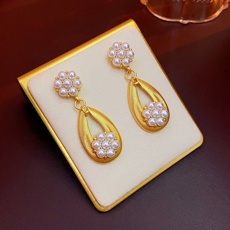 Conjunto de pendientes, collar y pulsera de aleación floral vintage, set de joyería minimalista chapado en oro para mujer