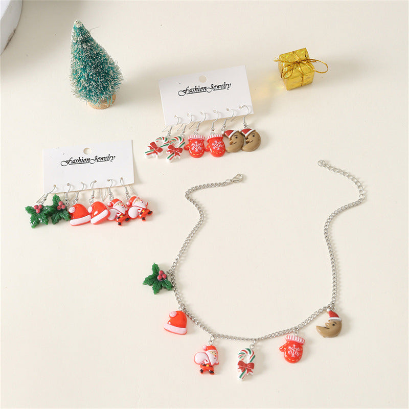 Set di collana e orecchini a tema natalizio con ciondolo di Babbo Natale in metallo e design a cappello di Babbo Natale per bambini