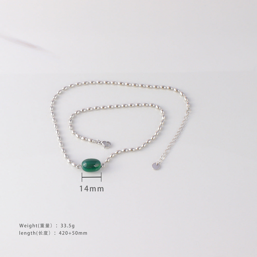 Collana da donna minimalista geometrica con perline verdi in acciaio al titanio con finitura placcata