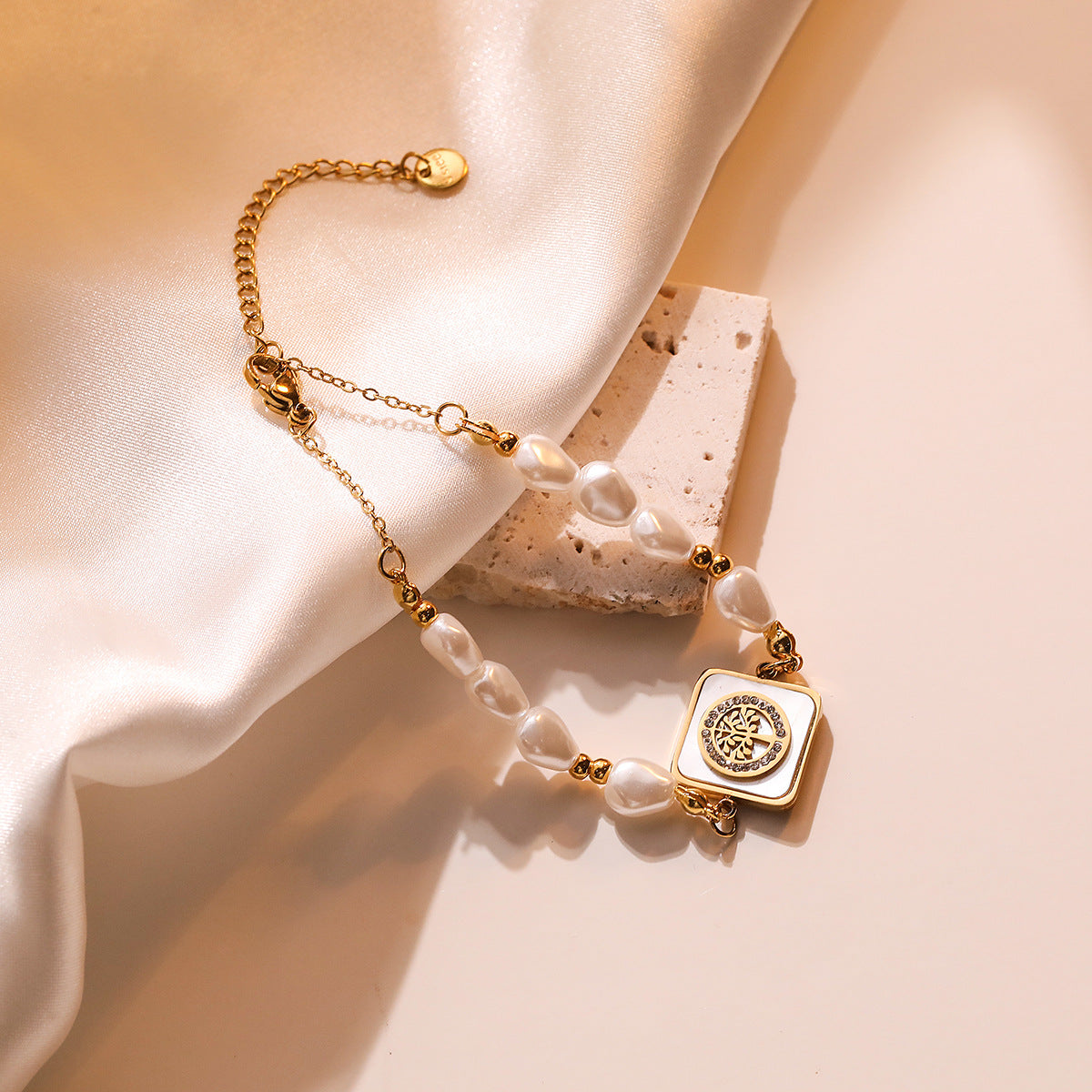 Minimalist Geometric Titanium Steel Bracelet with Gold Plating, Zircon Inlay, and Evil Eye Pendant
