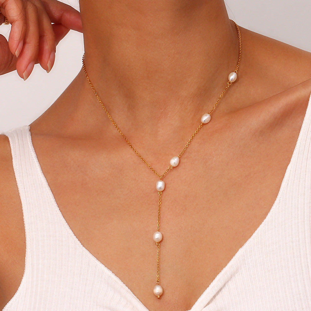 Collana a Y minimalista da donna con catena in acciaio inossidabile e pendente di perla d'acqua dolce