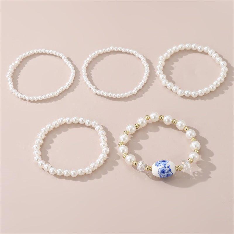 Conjunto de pulseras minimalistas florales vintage francesas para niñas hechas a mano con perlas de imitación y cuentas de cerámica, regalo elegante para cumpleaños o recuerdo de viaje