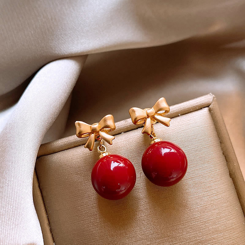 Orecchini a perno eleganti e minimalisti in resina a forma di fiocco da donna con perni in acciaio placcato, accessorio di moda di lusso