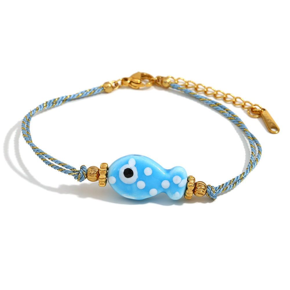 Bracciale da donna in corda intrecciata color oro, placcato in oro 18 carati, stile OL alla moda, a forma di pesce