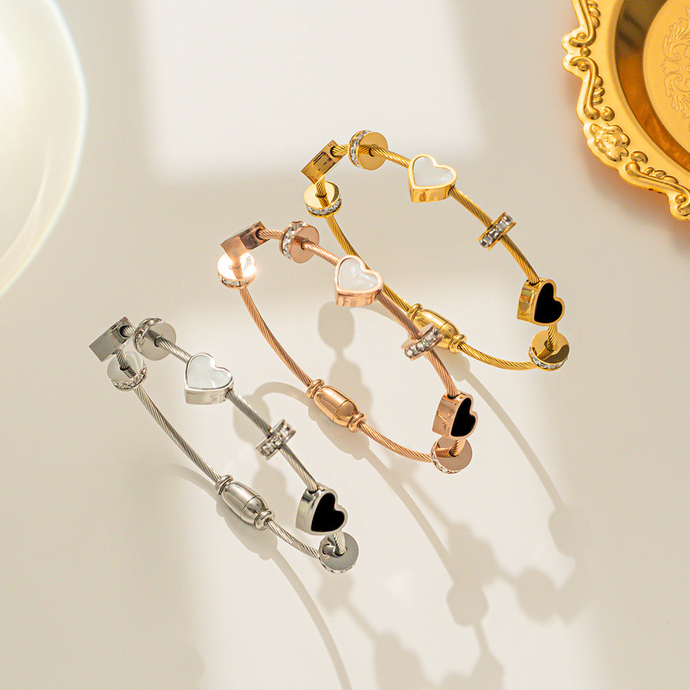 Minimalist Double Heart Titanium Steel Bracelet for Women with Micro-Paved Zirconia and Gold Plating