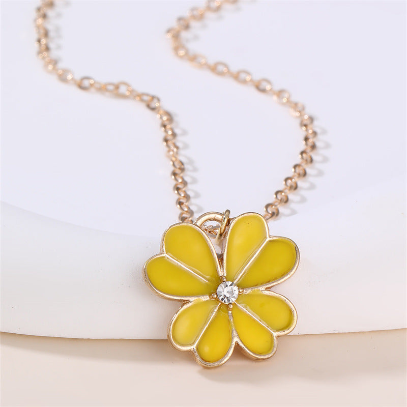 Collar con colgante esmaltado con forma de lazo floral dulce para niñas con dije de aleación y detalles de pedrería