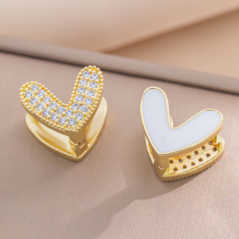 Orecchini a perno Saturno minimalisti color oro in ottone con zirconi per donna