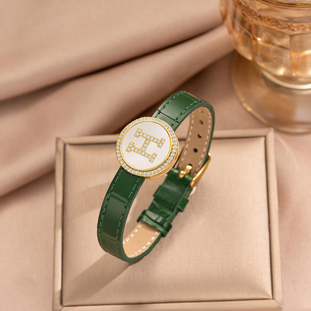 Pulsera de puño redonda chapada en oro de acero inoxidable minimalista con correa de cuero genuino para hombres y mujeres