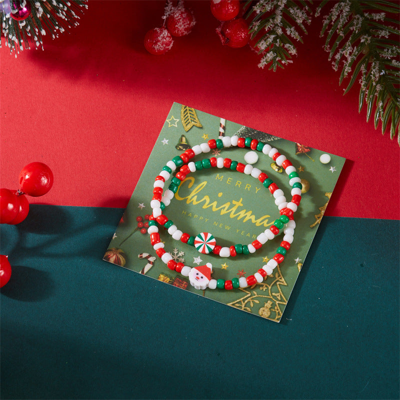 Set di bracciali natalizi fatti a mano in argilla polimerica con ciondoli a fiocco di neve e Babbo Natale per coppie