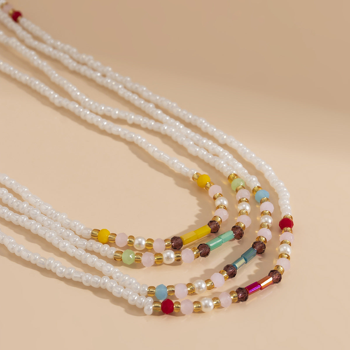 Cadena Corporal Elástica Minimalista para Mujer con Acentos de Cristales de Imitación y Detalles de Borlas