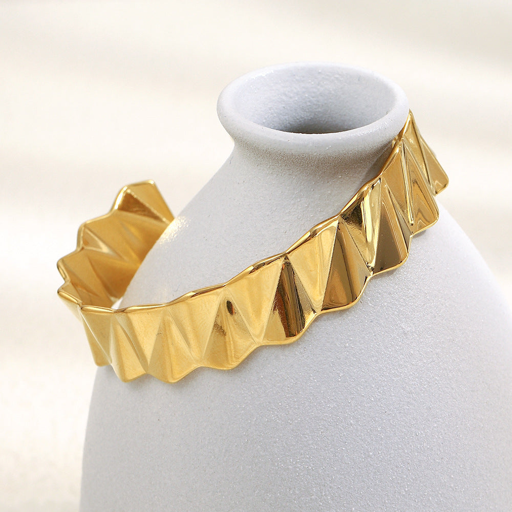 Bracciale da donna rigido in acciaio inossidabile placcato oro 18K con motivo a onda geometrico minimalista alla moda