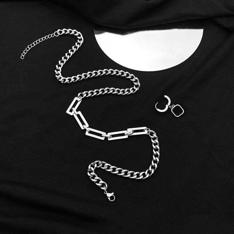 Collana minimalista geometrica in acciaio al titanio con ciondolo a croce lucido e design staccabile, per uomo e donna