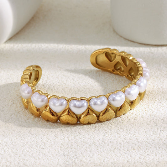 Bracciale alla moda minimalista a forma di cuore in acciaio inossidabile placcato oro 18 carati con perle simulate da donna