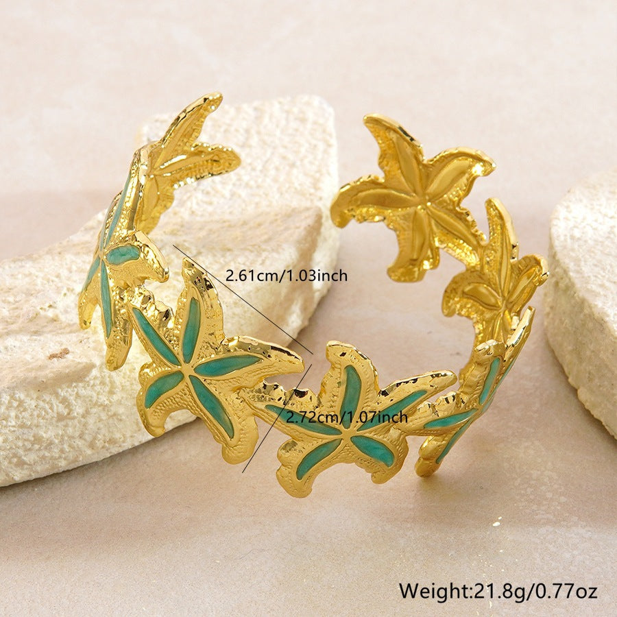 Elegante Bracciale a Polsino in Acciaio Inossidabile con Stella Marina e Goccia d'Olio