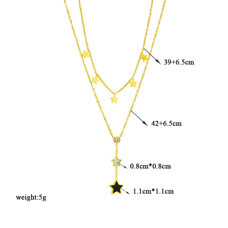 Collana con Pendente a Stella a Cinque Punte Geometrica Minimalista Nera e Bianca con Accenti di Strass su Catena a Maglie di Serpente in Acciaio al Titanio da Donna