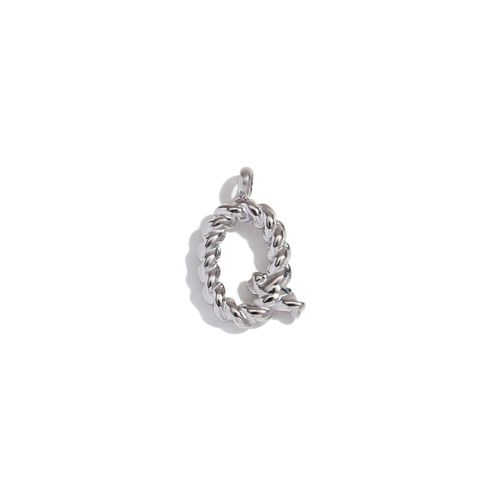 Colgante minimalista de acero inoxidable chapado en oro de 18 quilates con mini letra retorcida para mujer