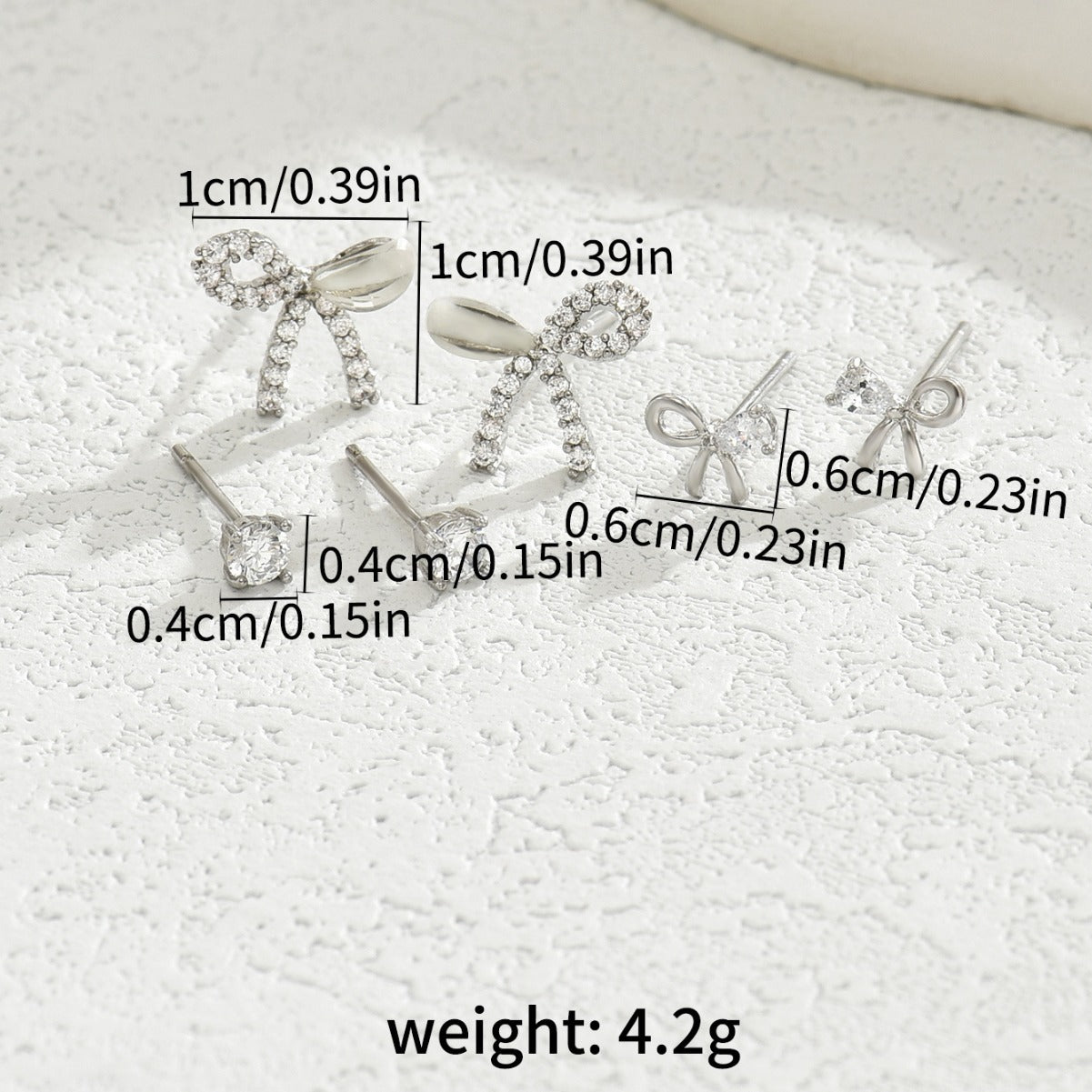Pendientes minimalistas de cobre con forma de lazo y circonita incrustada para mujer, diseño geométrico asimétrico