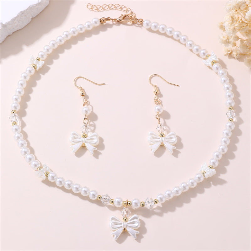 Set di Collana Minimalista per Bambine a Forma di Fiocco e Cuore in Resina con Finitura Placcata, per Età 3-10 Anni