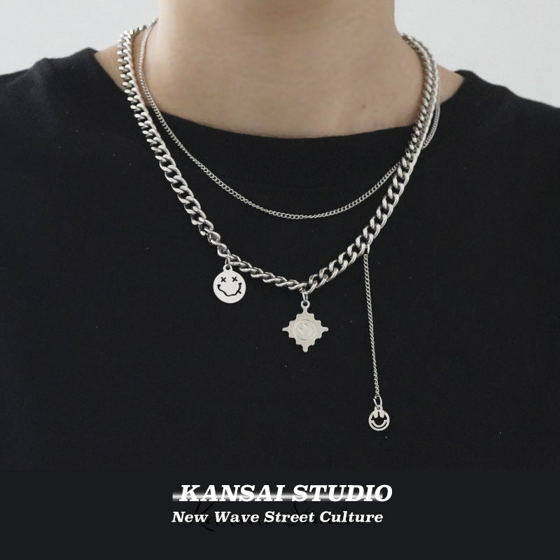 Collar con colgante geométrico minimalista atrevido con cadena de doble capa y detalles de borla en acero de titanio con acabado chapado